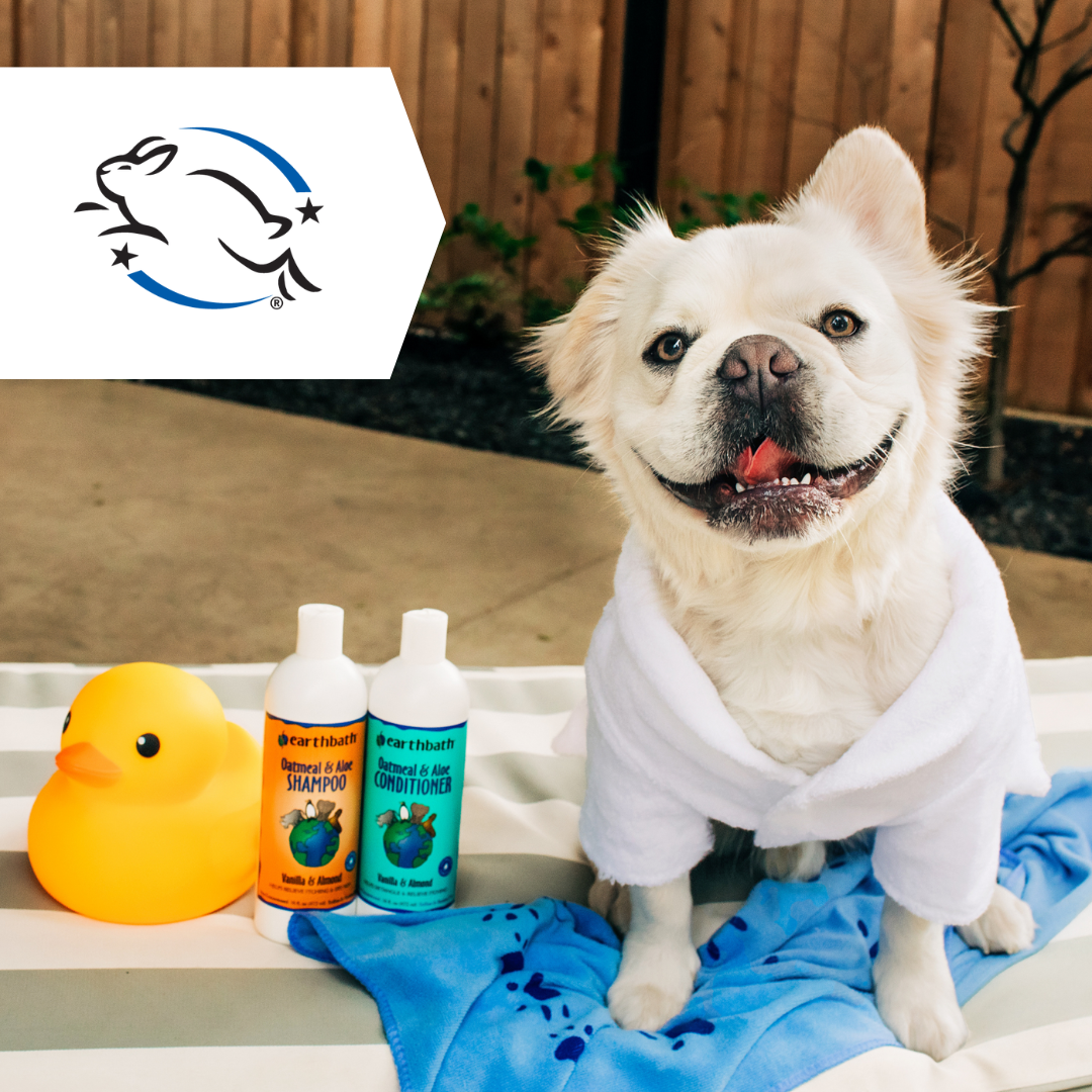 white dog on bench with earthbath products and Leaping Bunny logo