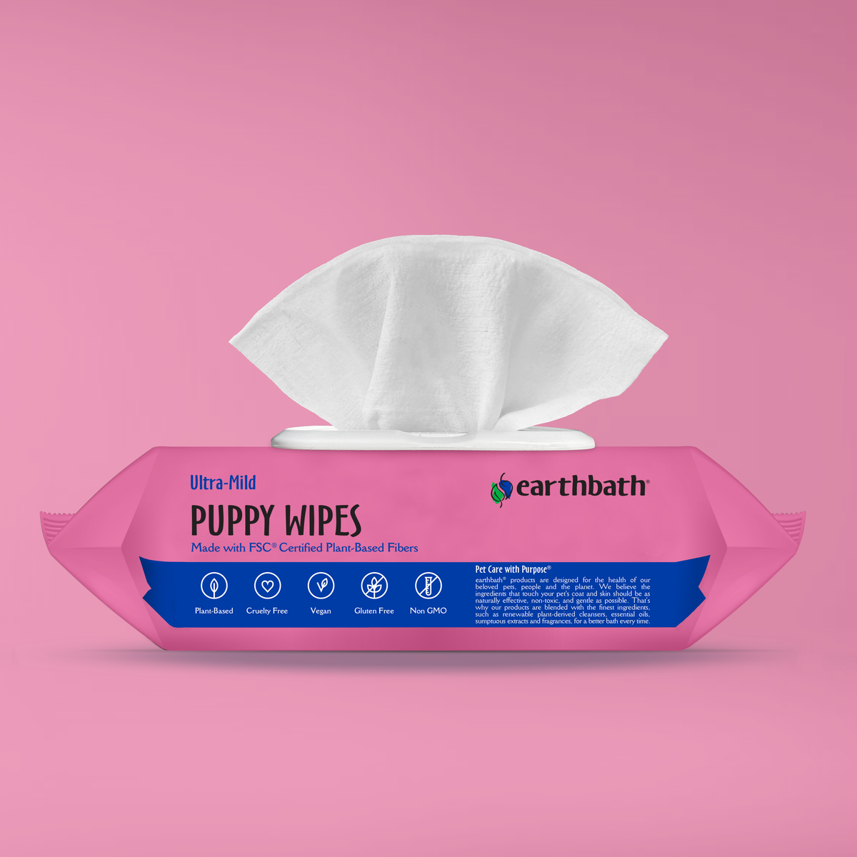 Pink package of Earthbath puppy wipes on a pink background