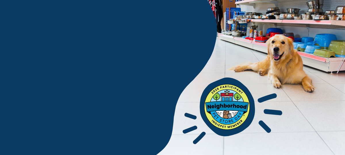 A golden retriever lies on a white tiled floor inside a pet store, with a large dark blue graphic overlay on the left and a circular Neighborhood Vet Center logo near the bottom center.