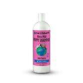 Bottle of Earthbath Ultra-Mild Puppy Shampoo with a pink label on a white background