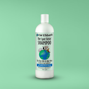 Earthbath Hot Spot Relief Shampoo bottle on a green background